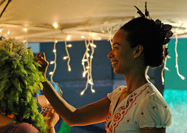 Applying a feather boa, 2009, photo by Alex Kahan